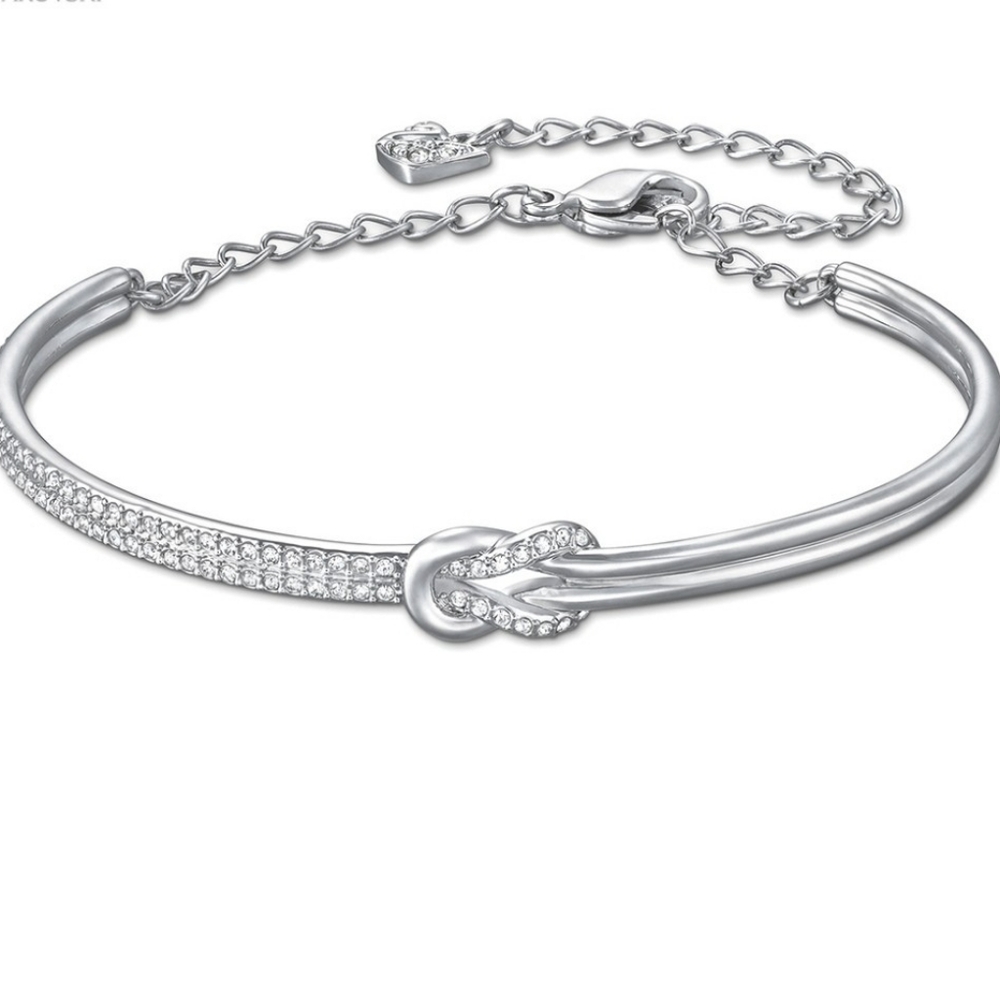Signed Swarovski Bracelet Voile Knot Crystal Rhodium Size M- Good Condition